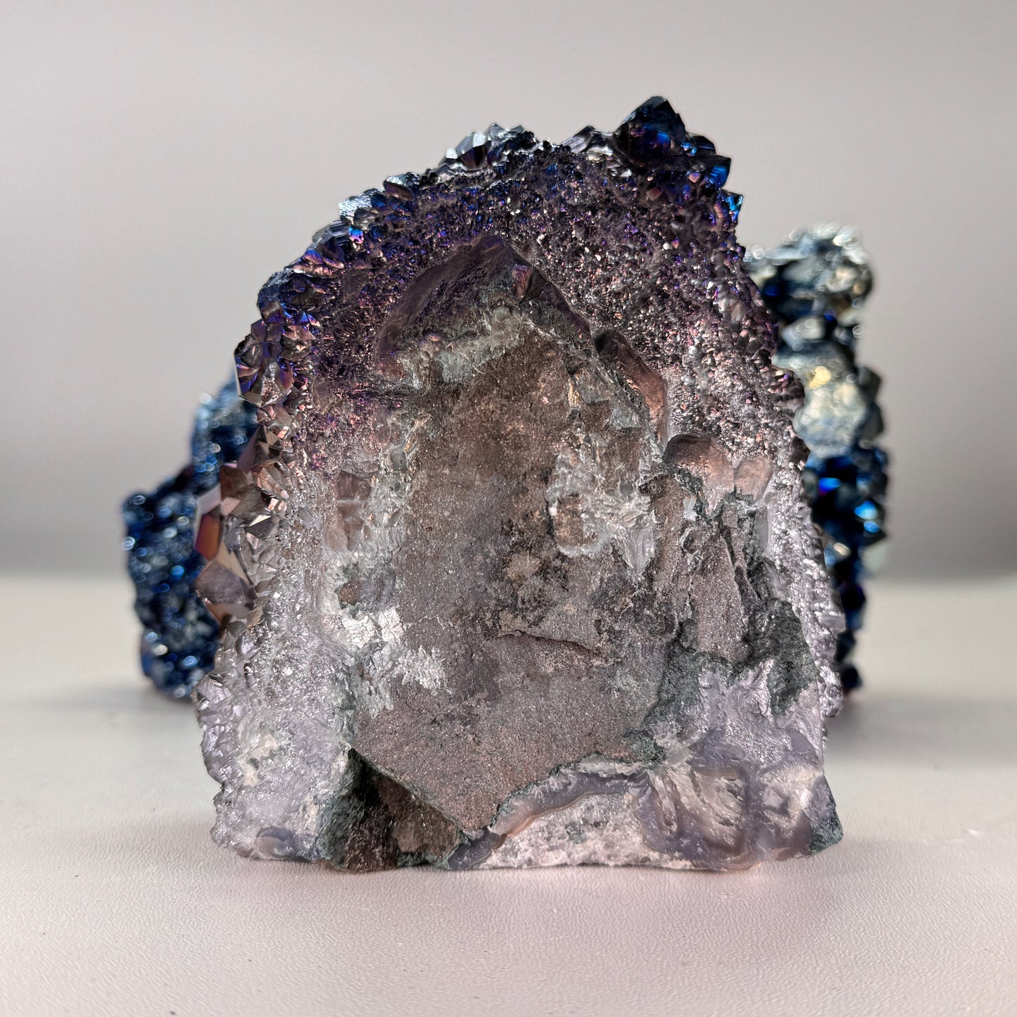 Titanium blue cluster cut base