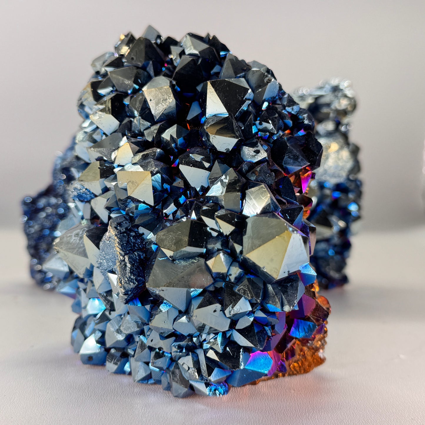 Titanium blue cluster cut base